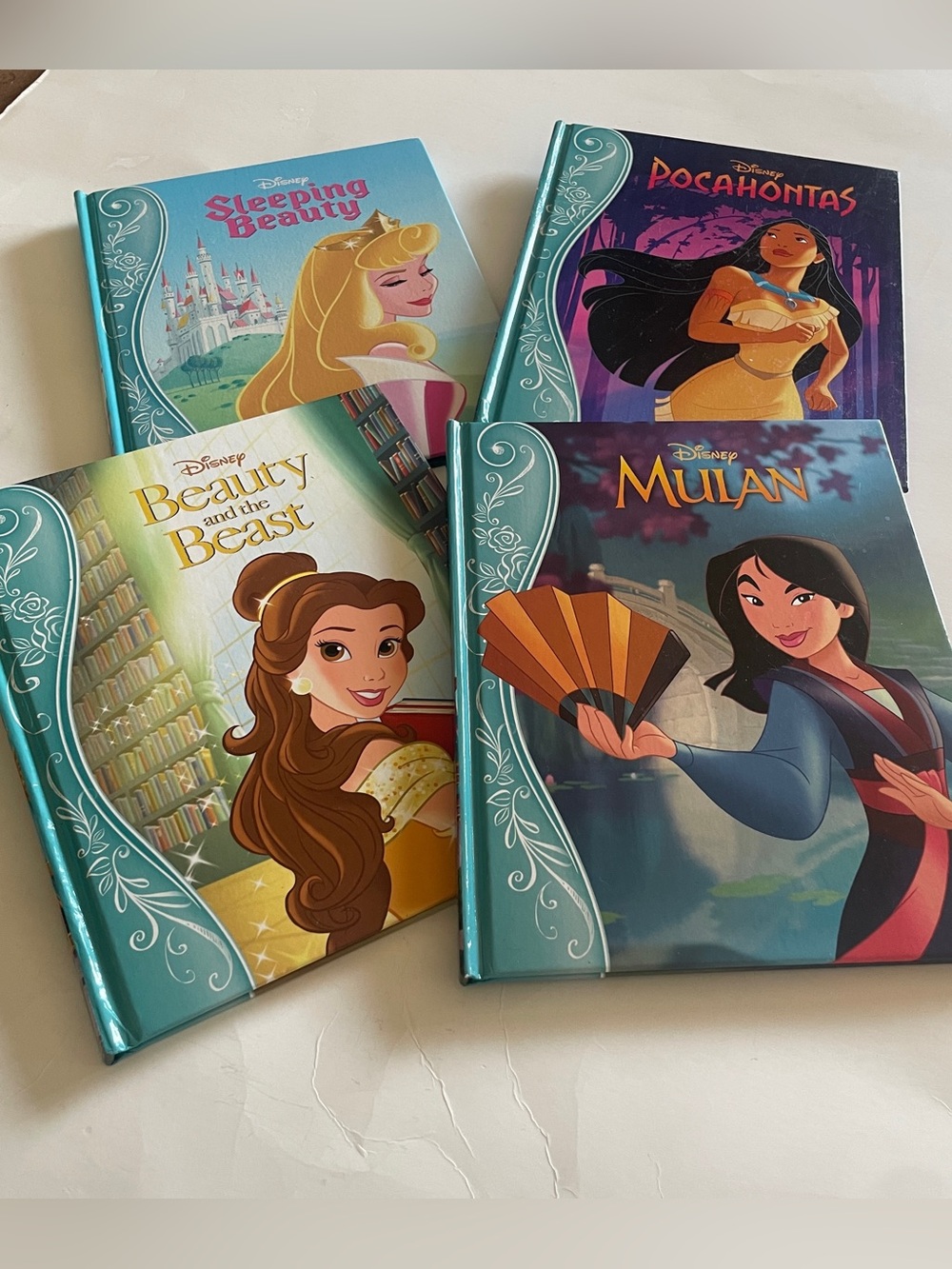 Disney NWOT set of 4…Beauty and the Beast, Sleeping Beauty, Pocahontas and Mulan